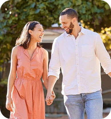 Happy couple walking outdoors